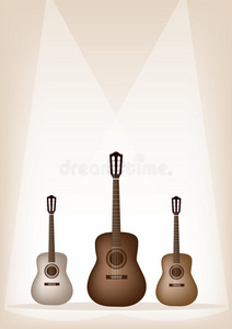三把棕色舞台背景的漂亮吉他图片
