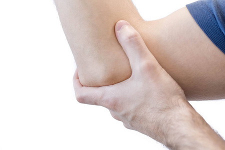 在手肘痛的男人.疼痛救济概念照片