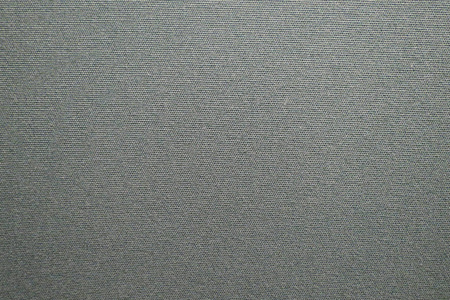 灰色无纺布聚丙烯织物表面作为背景有用照片