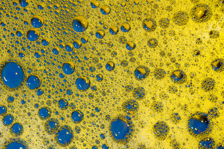蓝色和金色背景与气泡抽象纹理