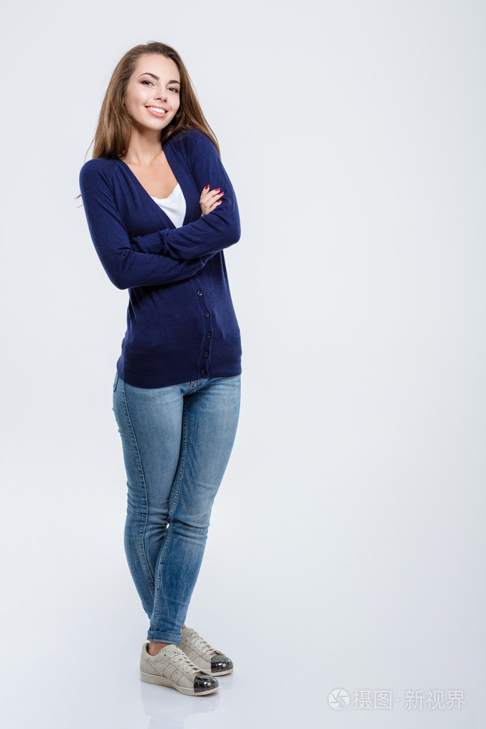 幸福的女人站着双臂