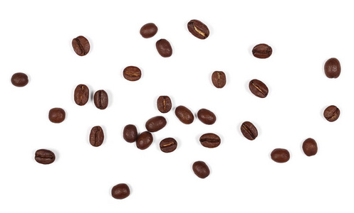 桩上白色背景和纹理，顶视图孤立的咖啡豆