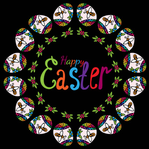 五彩缤纷的复活节快乐轮架在黑色背景上的鸡蛋
