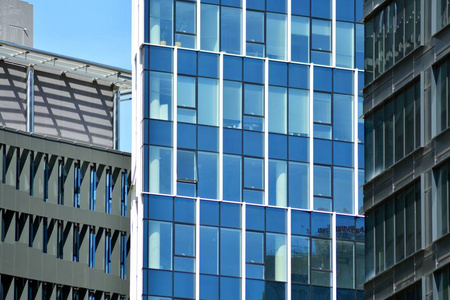 城市抽象背景,现代玻璃幕墙细部,写字楼商务建筑照片
