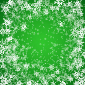 圣诞节的雪花在绿颜色的背景