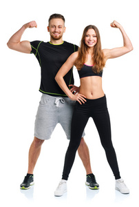 健壮的男人和女人在白色的健身运动后