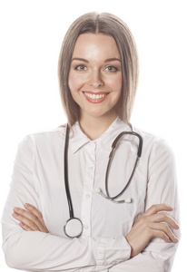 年轻漂亮的女医生用听诊器在白色背景上