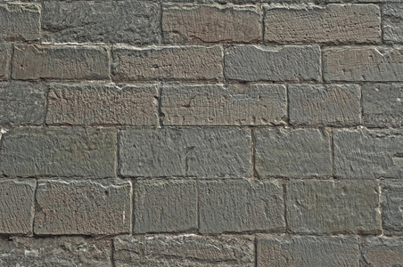 石灰石的中世纪古城墙的石头块纹理背景表面空照片