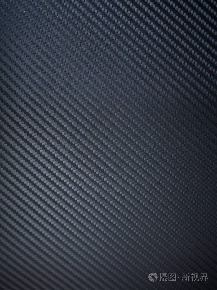 黑炭纤维纹理背景的宏观特写