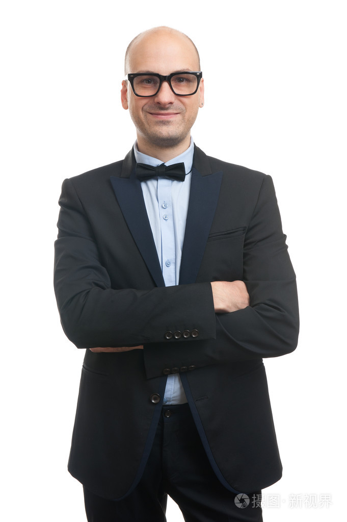秃头男子在西装和蝴蝶领结