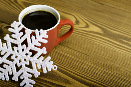 冲杯咖啡和一片雪花