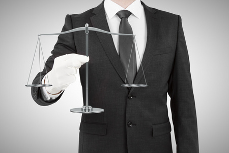 具鳞片戴着白手套的商人照片