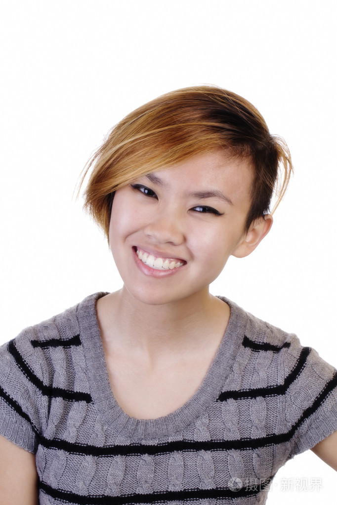 在针织顶部的瘦的亚裔美国妇女