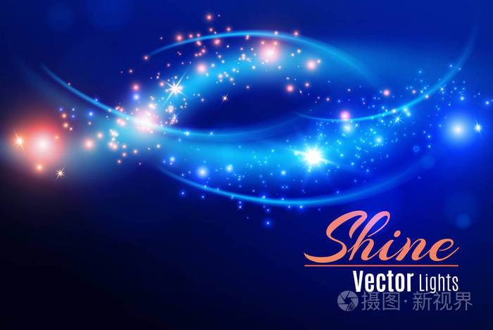 蓝色火花和星星闪光特殊的光效果.闪闪发光的魔法尘埃粒子.