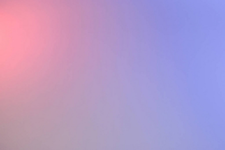粉色和蓝色渐变离焦抽象背景照片