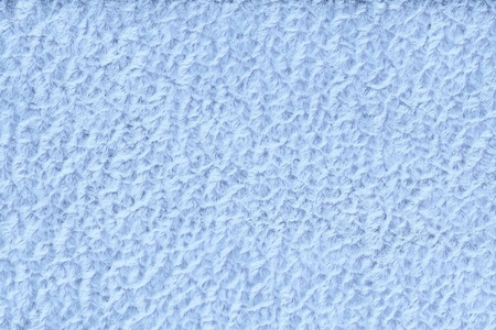 浅蓝色的蓬松背景的柔软, 蓬松的布.纹理的纺织特写照片