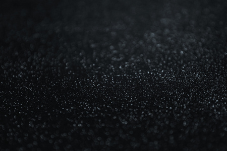 闪光复古灯背景.亮银色, 蓝色和黑色.离焦照片