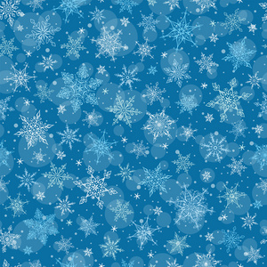 无缝的冬天背景雪花模式图。蓝色的背景