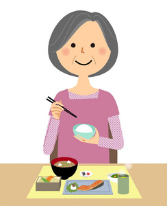 一对夫妇在餐馆吃饭时,幸福的女人指着什么老妇人, 我们吃吧/这是一个