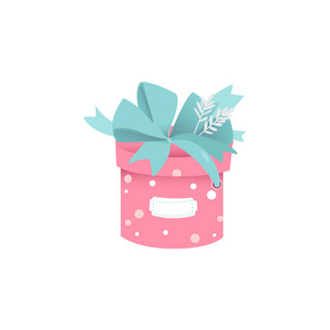 可爱的圆形礼品盒粉红色的圆点图案和大郁郁葱葱的蓝色弓