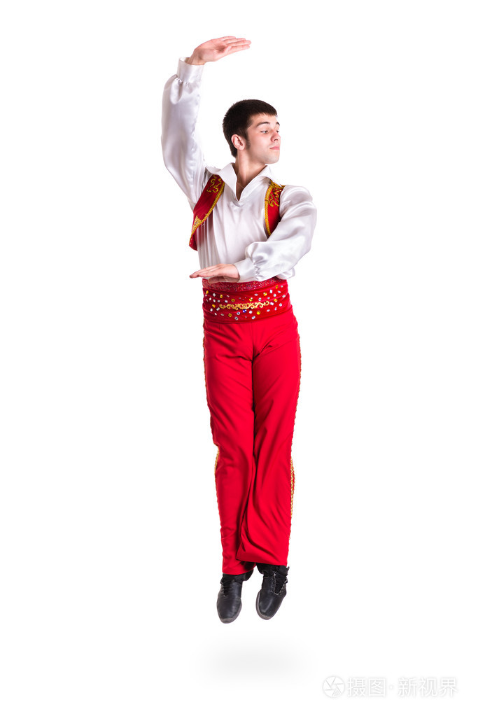 跳跃的穿斗牛士服装的人白色在全长上孤立