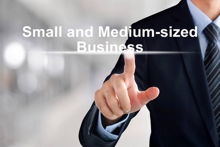 商人手摸中小型企业或中小型企业