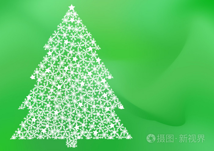 雪花飘落在绿色的圣诞树