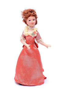 瓷娃娃在粉红色的连衣裙
