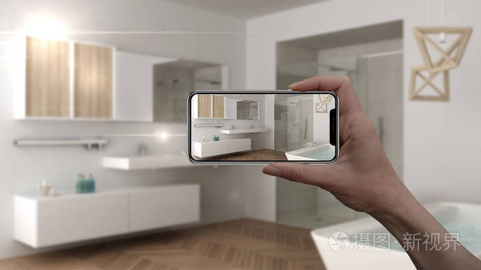 手持智能手机 Ar 应用 模拟家具和室内设计产品在真正的家庭 建筑师设计师的概念 模糊背景 斯堪的纳维亚浴室照片 正版商用图片0o57mn 摄图新视界