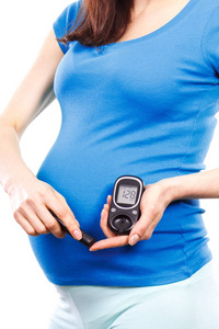 血糖仪检查血糖水平，怀孕期间患糖尿病的孕妇