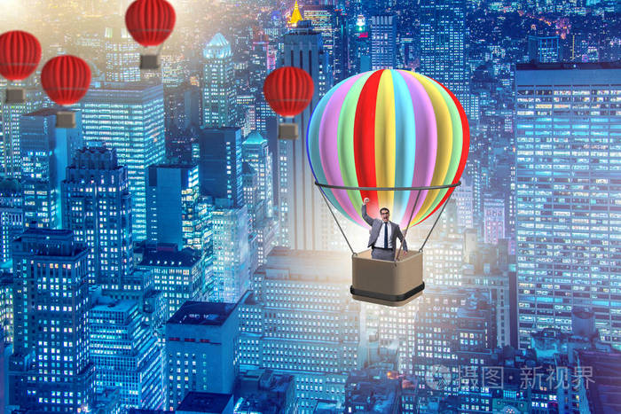 商人在挑战概念的气球飞