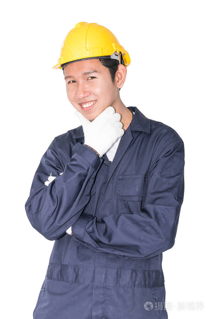 站在白色的年轻工人