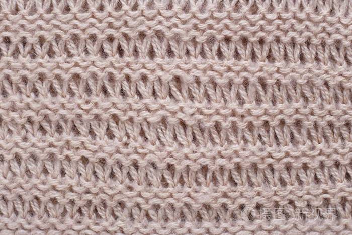 采用花纹的米色羊毛织物的针织质地.copyspace