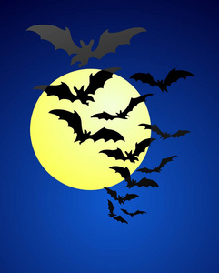 一群蝙蝠在晴朗的天空中飞翔在满月前