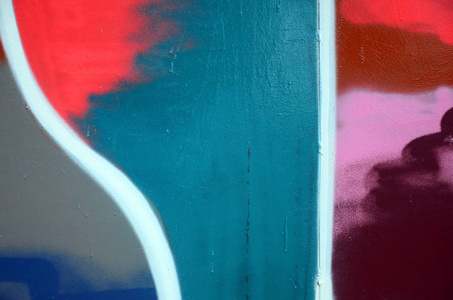 街头艺术。彩色涂鸦画片断的抽象背景图像在时髦的颜色