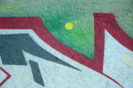 街头艺术。在铬和红色色调的彩色涂鸦画片断的抽象背景图像