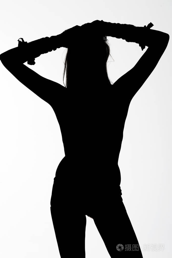 白色背景上的长毛的女人剪影