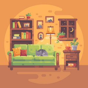 舒适的室内与书籍和猫睡在沙发上, 舒适的晚上在家