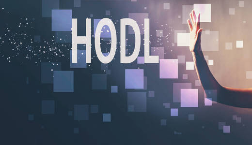 Hodl 的手在黑暗的背景下