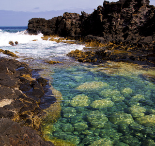 多云的海滩水兰萨罗特岛岛西班牙岩石 sk