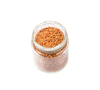 在一个罐子里的棕色小米
