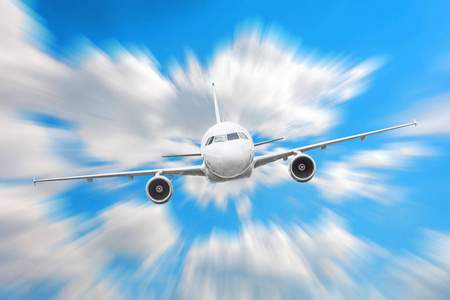 飞机在天空上空上空的云层飞行旅程太阳高度速度运动模糊照片