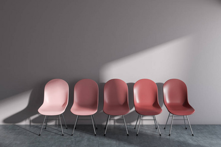 一排红椅子站在白色的墙上, 在灰色的地板上空荡荡的房间里。候诊室设计的诊所办公公司。3d 渲染模拟墙体