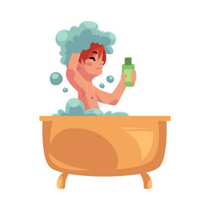 小男孩洗澡,坐在浴缸,洗头发的洗发水照片