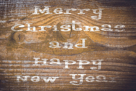 圣诞祝福用旧木板。特写