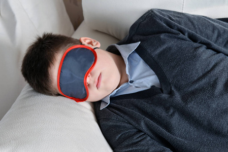 为睡觉青少年在掩码为睡眠白天睡觉照片