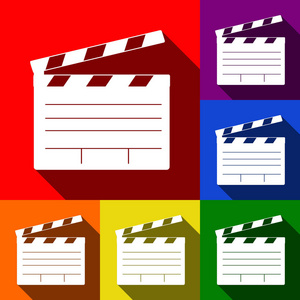 电影拍板电影院的迹象。矢量。一套与平面阴影在红色 橙色 黄色 绿色 蓝色和紫色背景图标
