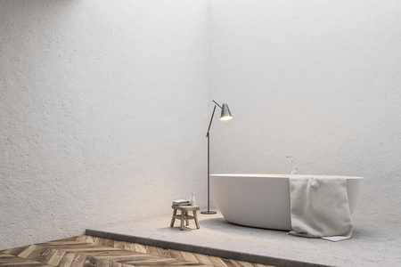 一个白色浴缸的角落里挂着毛巾, 站在简约浴室的水泥地板上。一把小椅子。3d 渲染模拟