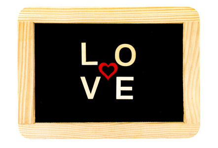 木制相框复古黑板上用爱创造的木材字母词的白色孤立