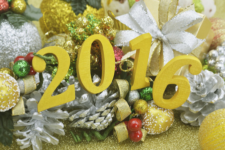 圣诞装饰品上黄金背景 2016年新年装饰